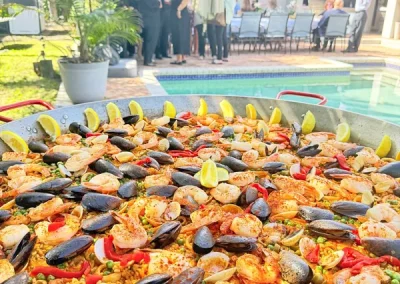 Live poolside seafood paella catering event in Broward South Florida